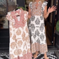 Елегантна печатана рокля с къдрици без ръкави на жените